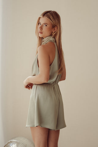 Satin playsuit with halter neck, green - Trix
