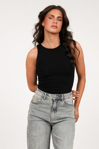 Halter stretch bodysuit in black - Davina