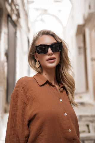 Sunglasses with rectangular black frame
