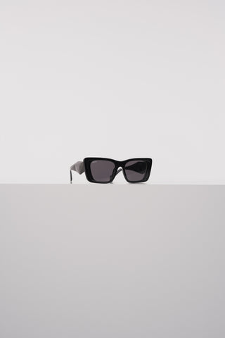 Sunglasses with rectangular black frame