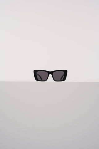 Sunglasses with rectangular black frame